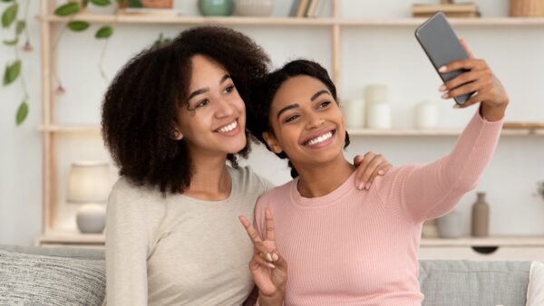 Selfie of girlfriends for social networks and blog during coronavirus